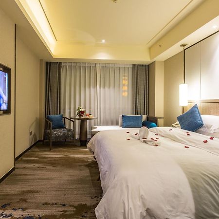 Oriental Hotel Tong Xiang Цзясин Экстерьер фото