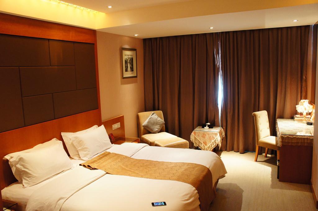 Oriental Hotel Tong Xiang Цзясин Номер фото