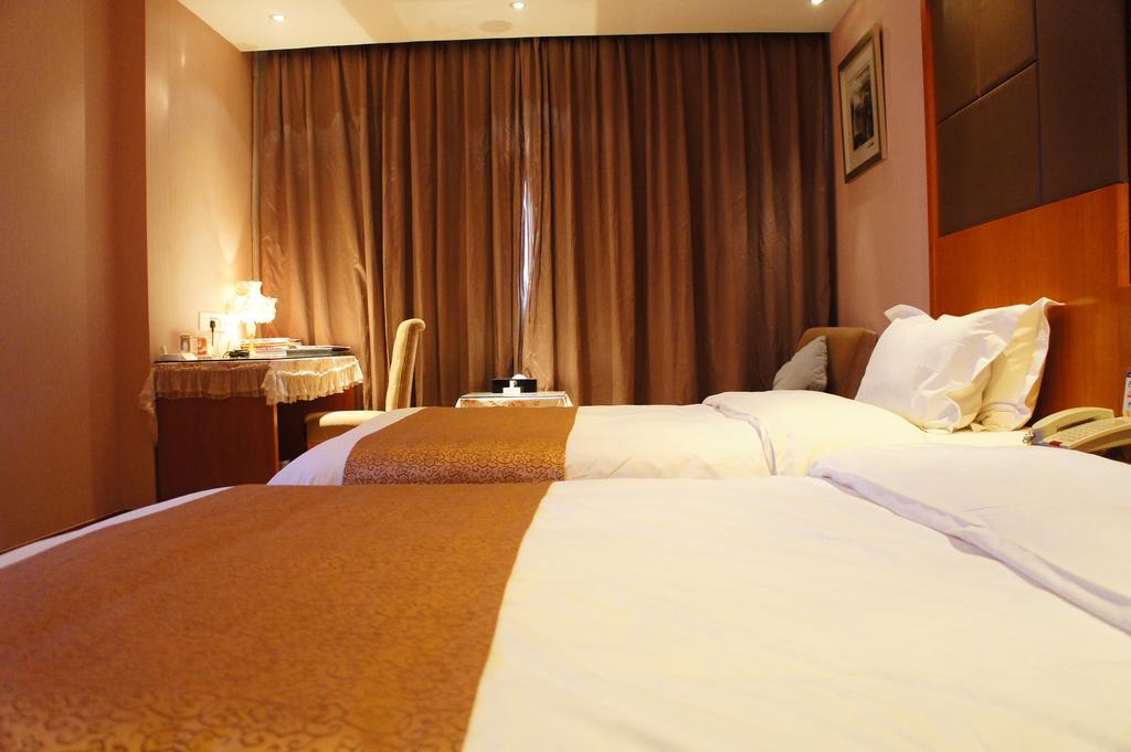 Oriental Hotel Tong Xiang Цзясин Номер фото