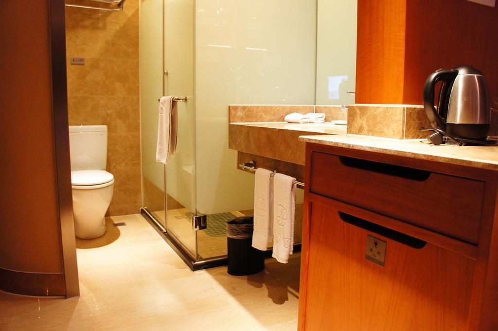Oriental Hotel Tong Xiang Цзясин Номер фото