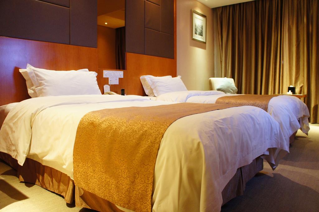 Oriental Hotel Tong Xiang Цзясин Номер фото