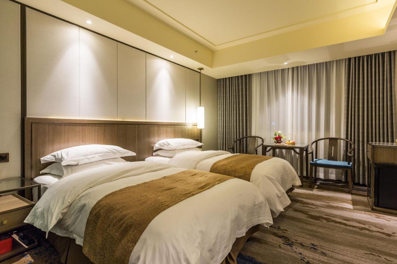 Oriental Hotel Tong Xiang Цзясин Экстерьер фото