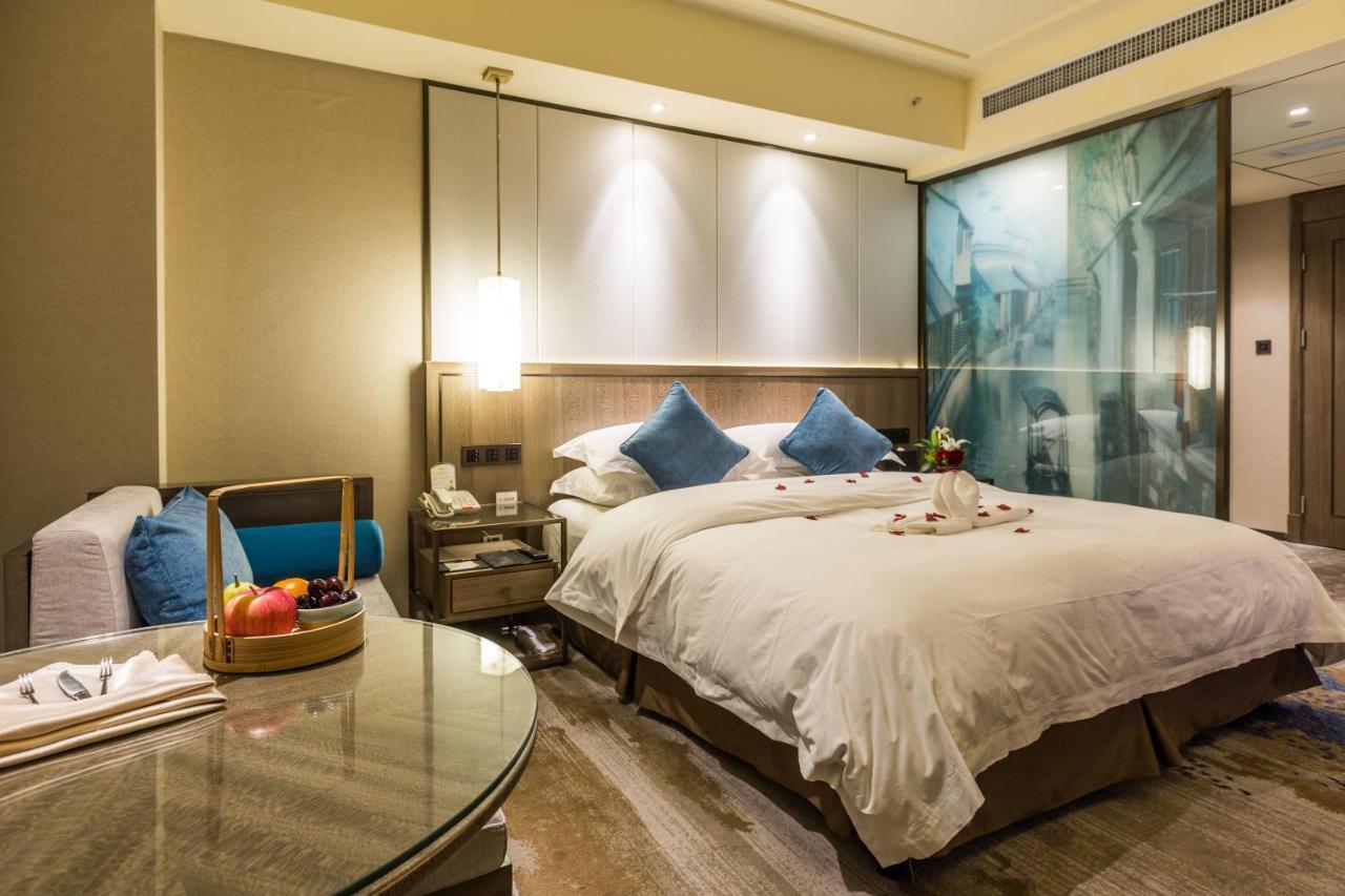 Oriental Hotel Tong Xiang Цзясин Экстерьер фото