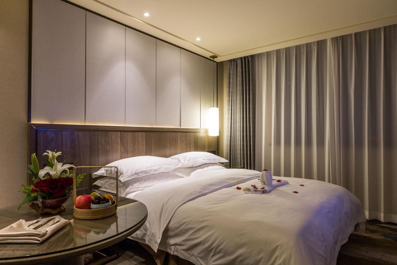 Oriental Hotel Tong Xiang Цзясин Экстерьер фото